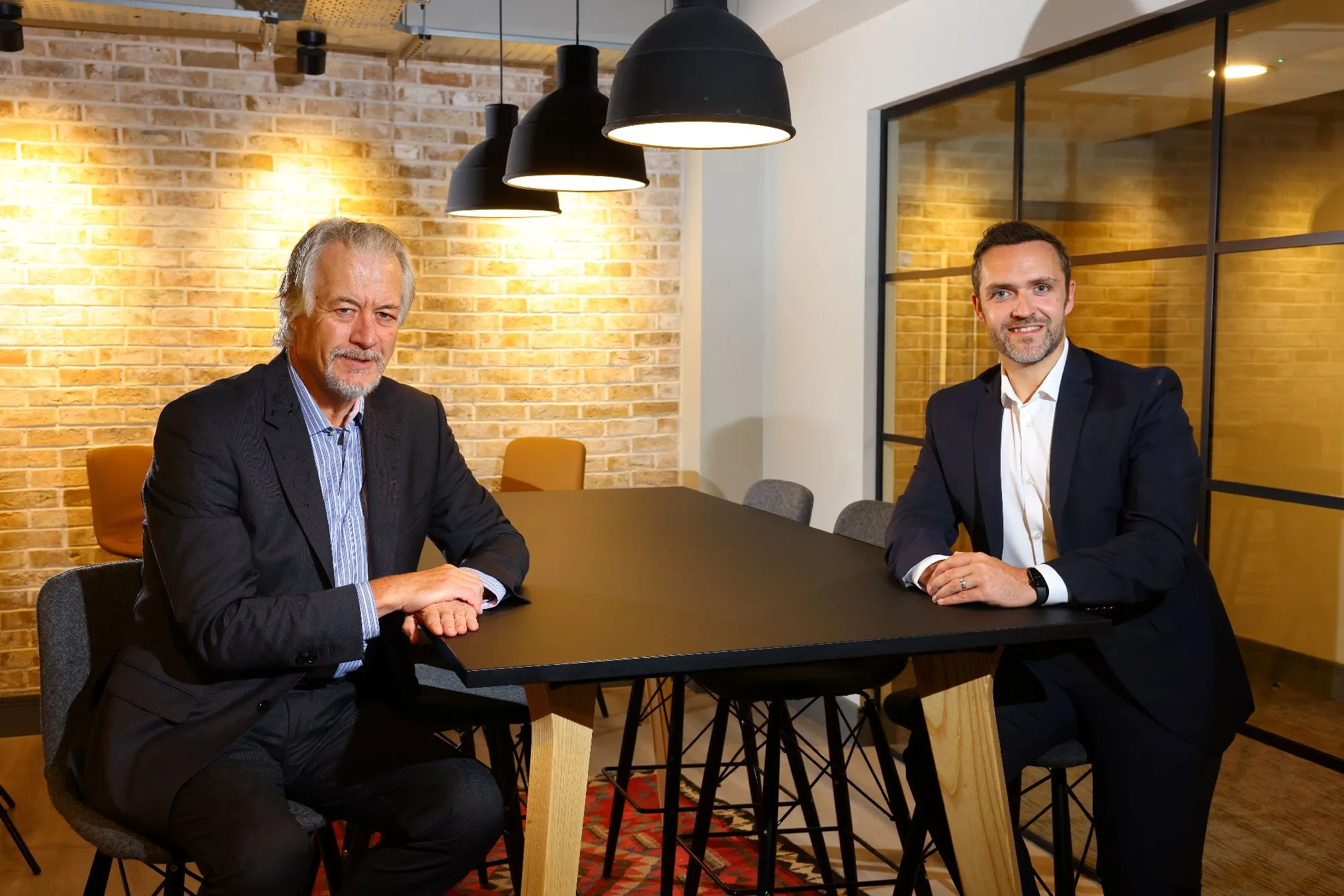 Image of Daniel Wade with Keith Charlton of FW Capital